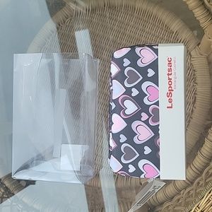 Le Sportsac black and pink rectangular makeup bag